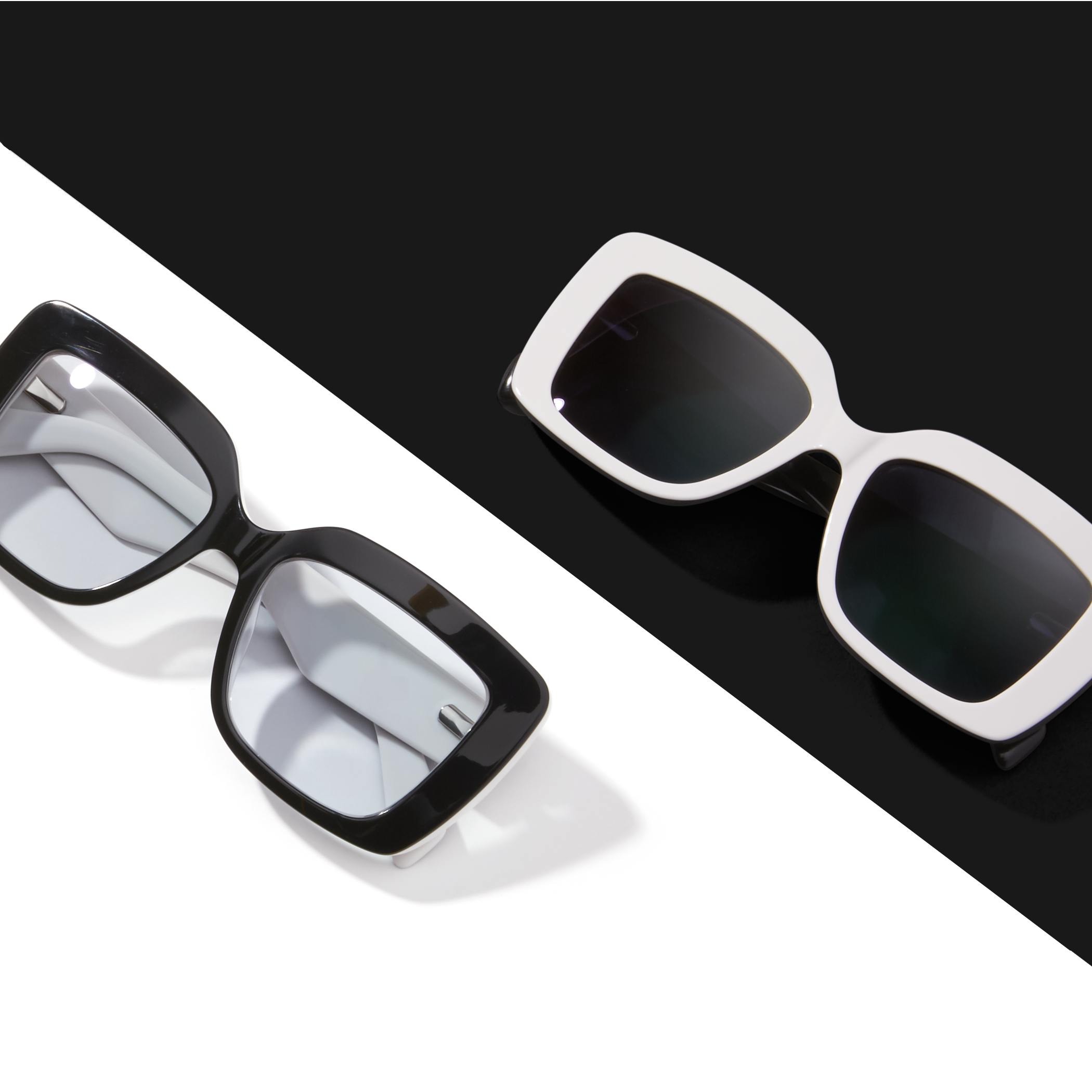 Two pairs of rectangular sunglasses: one with black frames, the other with white frames.